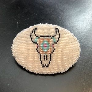 Buffalo beaded belt buckle